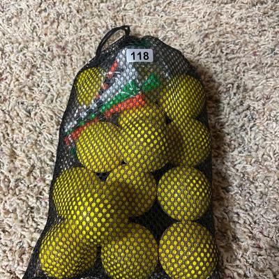 Practice golf balls and tees