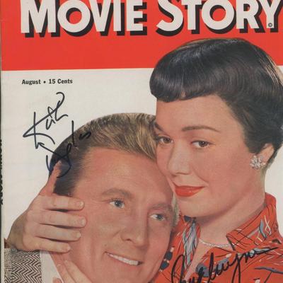 Kirk Douglas and Jane Wyman signed "Movie Story Magazine". GFA Authenticated
