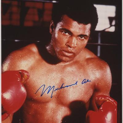 Muhammad Ali signed photo. GFA Authenticated