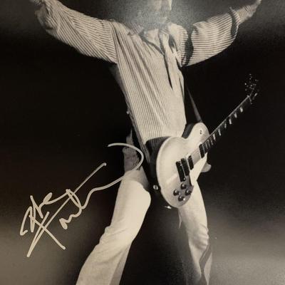 Pete Townshend signed photo. GFA Authenticated