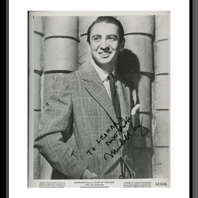 MacDonald Carey signed "Cave of Outlaws" movie photo 