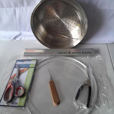 New Seafood eating utensils and large stainless steel strainer pot
