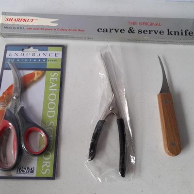 New Seafood eating utensils and large stainless steel strainer pot