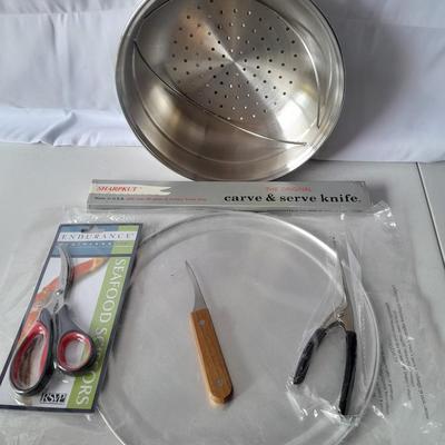 New Seafood eating utensils and large stainless steel strainer pot