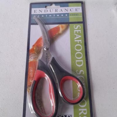New Seafood eating utensils and large stainless steel strainer pot