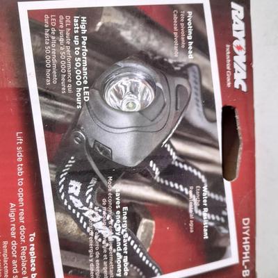 Camping or Prepping items - Rayovac headlamp - 12 cans of cooking fuel - and a LED Lantern