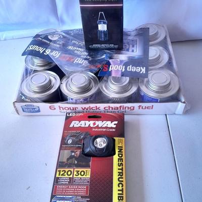 Camping or Prepping items - Rayovac headlamp - 12 cans of cooking fuel - and a LED Lantern