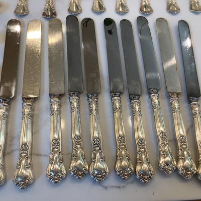 Silver- Essentials in Silver, 10 dinner knives, 12 forks, 10 spoons, 10 salad forks, 11 soup spoons