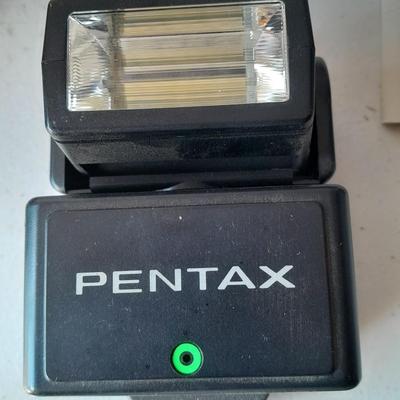 Vintage Pentax 35 MMM camera with flash and accessories
