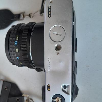 Vintage Pentax 35 MMM camera with flash and accessories