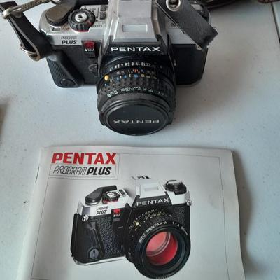 Vintage Pentax 35 MMM camera with flash and accessories