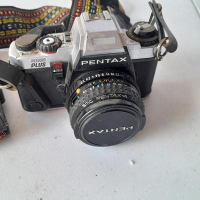 Vintage Pentax 35 MMM camera with flash and accessories