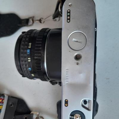 Vintage Pentax 35 MMM camera with flash and accessories