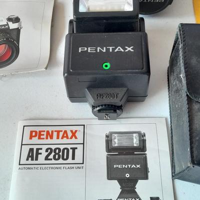 Vintage Pentax 35 MMM camera with flash and accessories