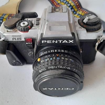 Vintage Pentax 35 MMM camera with flash and accessories