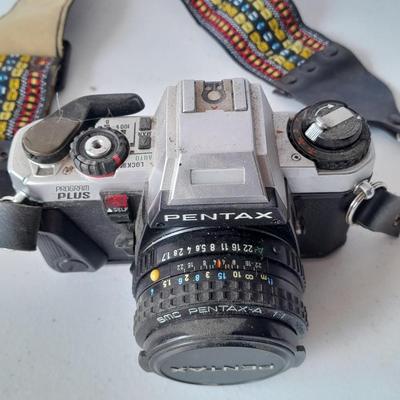 Vintage Pentax 35 MMM camera with flash and accessories