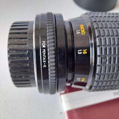 Two 35 mm camera lenses - Sigma - Vivitar 2X Tele Converter both with instructions 35mm camera