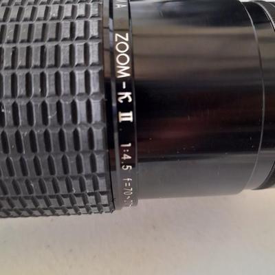 Two 35 mm camera lenses - Sigma - Vivitar 2X Tele Converter both with instructions 35mm camera