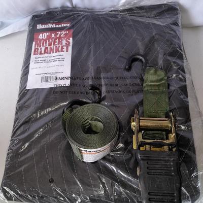 New moving blanket with like new wide Haul Master ratchet strap