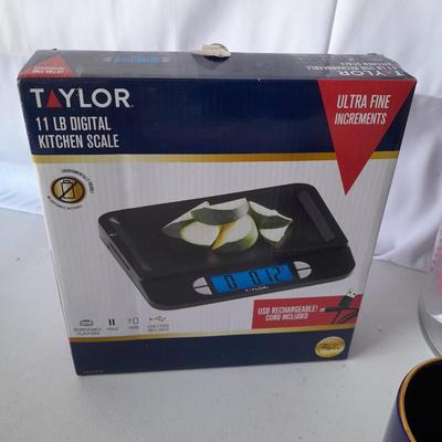 Kitchen items - 2 brand new Mugs - Glass tea dispenser / pitcher and a new 11lb Taylor food scale