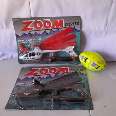 Two new in package ZOOM Copter Zooms over 100 feet no batteries required with new Poof football