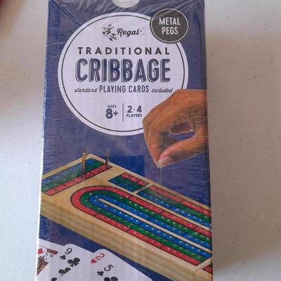 Board games and brand-new puzzles - new cribbage - bag of ducks - Yahtzee - Pente -Keyboard starter kit