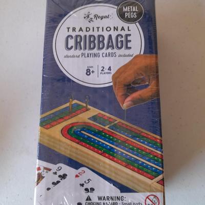Board games and brand-new puzzles - new cribbage - bag of ducks - Yahtzee - Pente -Keyboard starter kit
