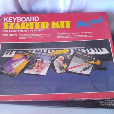 Board games and brand-new puzzles - new cribbage - bag of ducks - Yahtzee - Pente -Keyboard starter kit