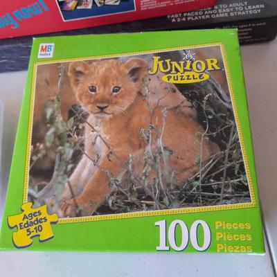 Board games and brand-new puzzles - new cribbage - bag of ducks - Yahtzee - Pente -Keyboard starter kit