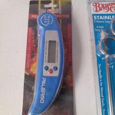 New Kitchen necessities - Cookbooks - thermometer - seasoning injection tool - and new wax paper