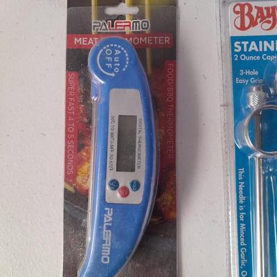 New Kitchen necessities - Cookbooks - thermometer - seasoning injection tool - and new wax paper
