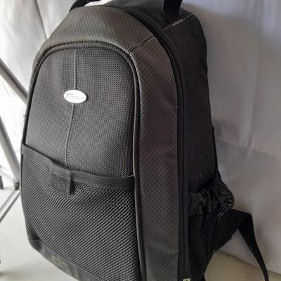 Nice Targus padded and divided camera backpack style bag with Targus adjustable Tripod