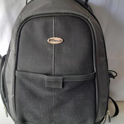 Nice Targus padded and divided camera backpack style bag with Targus adjustable Tripod