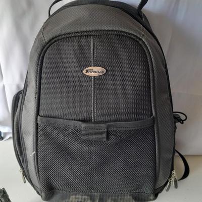 Nice Targus padded and divided camera backpack style bag with Targus adjustable Tripod