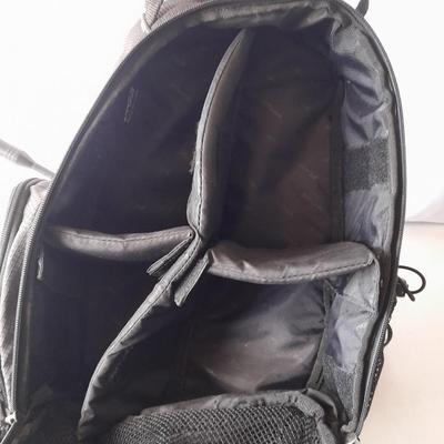 Nice Targus padded and divided camera backpack style bag with Targus adjustable Tripod