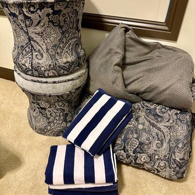 A King Size Comforter with 2 Matching pouf style Stools and a set of Navy/White towels from Pottery Barn Kids