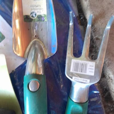 New tarp - new garden hand tools - Flower pot and new pocket hose