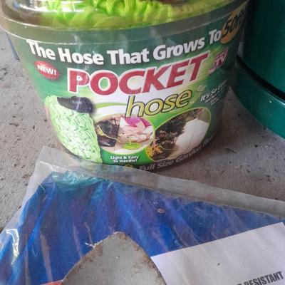 New tarp - new garden hand tools - Flower pot and new pocket hose