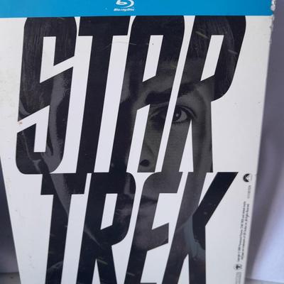 Three Blu ray dvd movies - Star Trek - Guardians of the Galaxy - and Serenity
