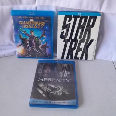 Three Blu ray dvd movies - Star Trek - Guardians of the Galaxy - and Serenity