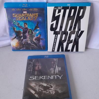 Three Blu ray dvd movies - Star Trek - Guardians of the Galaxy - and Serenity