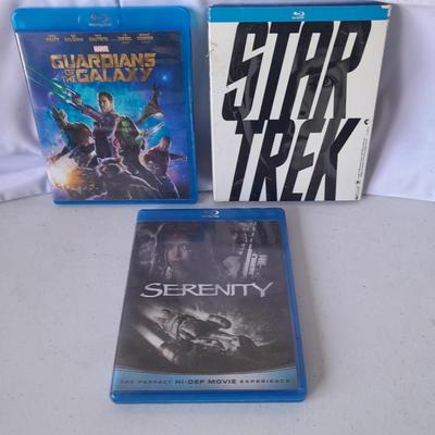 Three Blu ray dvd movies - Star Trek - Guardians of the Galaxy - and Serenity
