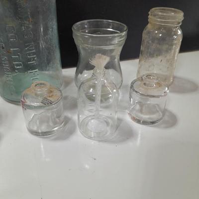 Collection of old and newer bottles - Princess house oil lights