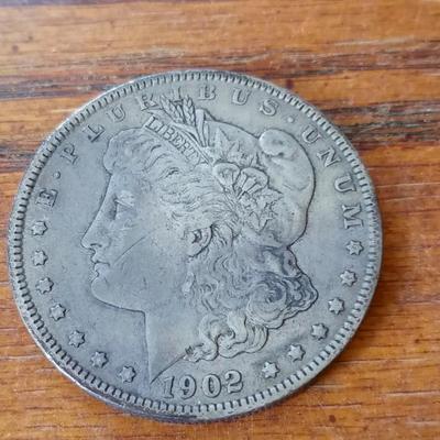 LOT 49 1902 SILVER DOLLAR
