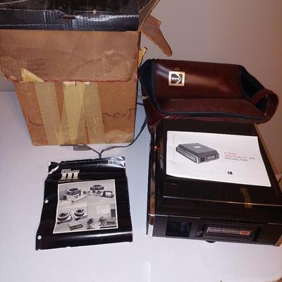 2 vintage slide projector with extras