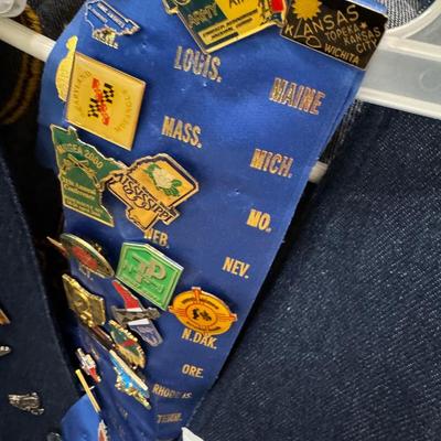 Vests with Military Convention Pins and Naval Academy graduation certificate