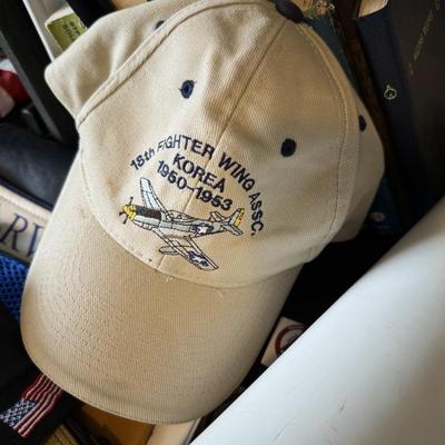Airplane light switch, WWIl gun oil can, flags, pictures and hats, Military Memorabilia