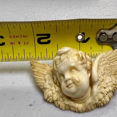Antique Ivory Cherub Brooch