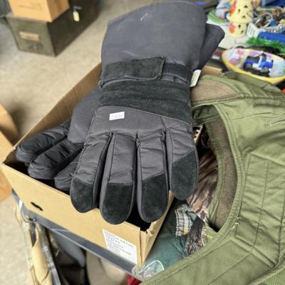 Camo hats, gloves, and military literature
