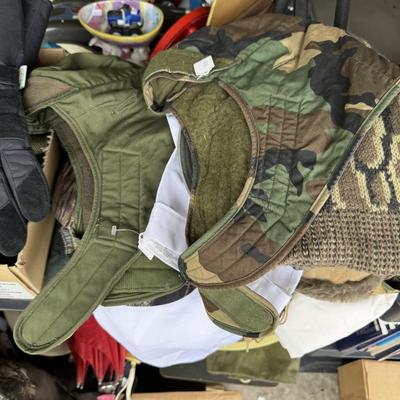 Camo hats, gloves, and military literature